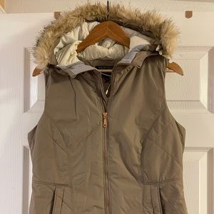 Mountain Hardware vest with fux fur hood.